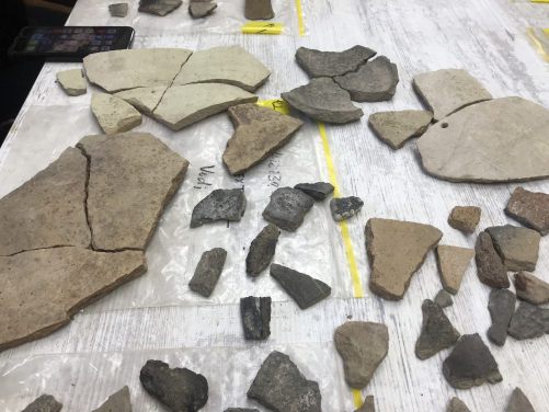 Ancient pottery often comes out of the ground broken into various fragments, but one of the funniest aspects of archaeology is piecing these back together like a puzzle.  Photograph by Yadian Wang
